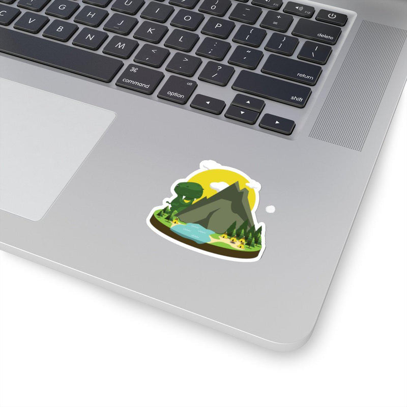 Dinosaur sticker with T-Rex peaking around a mountain looking over native american teepees. 