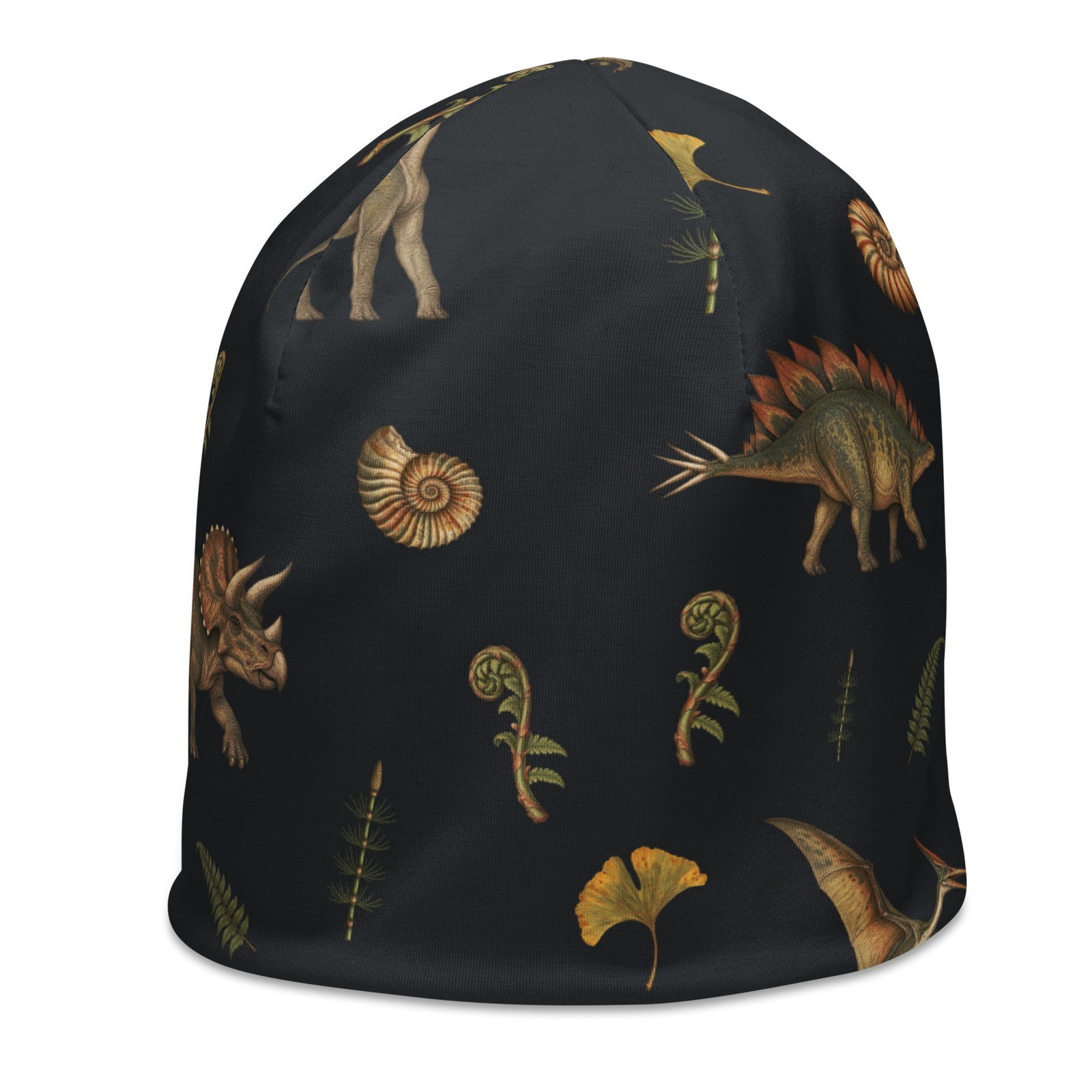 Left front view of the Museum Dinosaurs beanie with vintage dinosaur, ammonite and ginkgo leaf pattern on charcoal