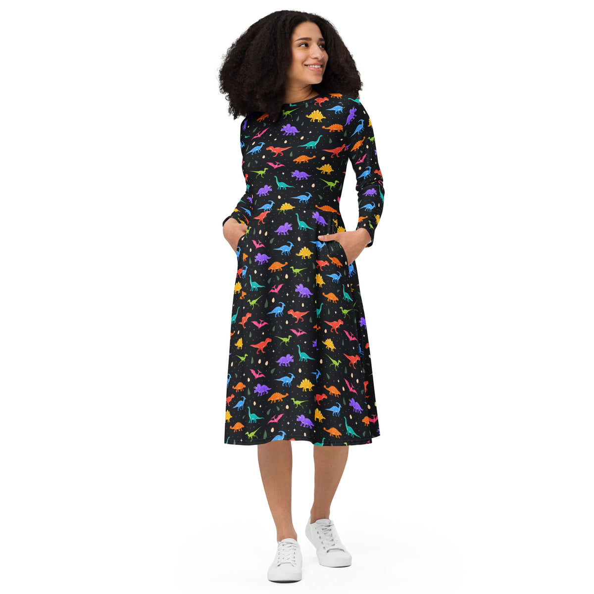 Midnight Dinos women's long sleeve dinosaur dress, front view: colorful T-rex, triceratops and stegosaurus on a black midi dress