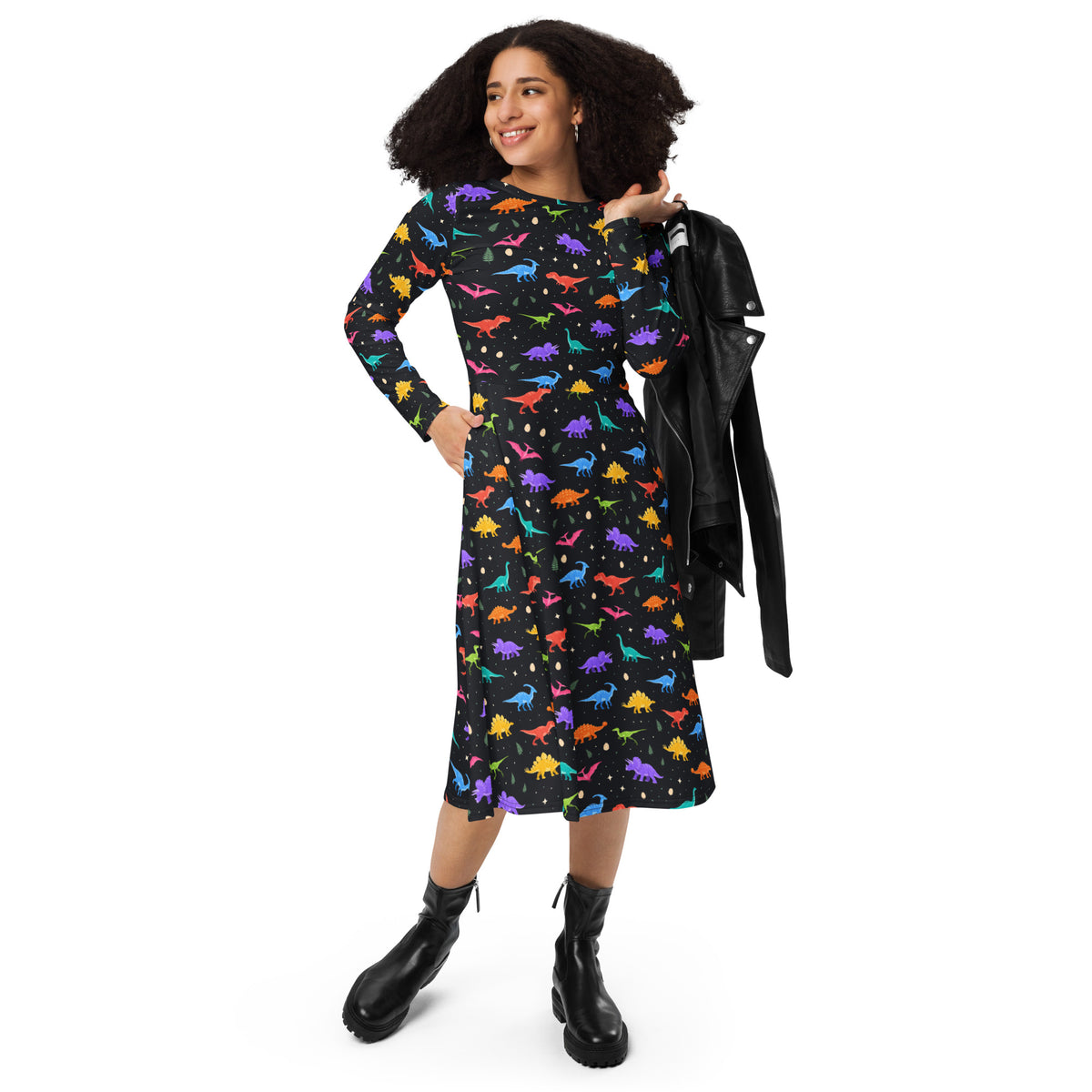 Woman wearing the Midnight Dinos long sleeve dinosaur dress, black midi dress with colorful dinosaurs