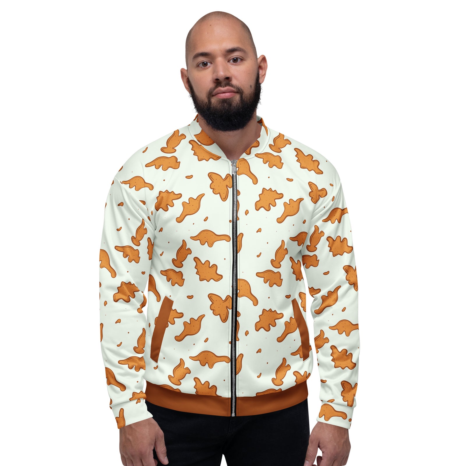 Man wearing the Dino Nuggies all-over print dinosaur bomber jacket