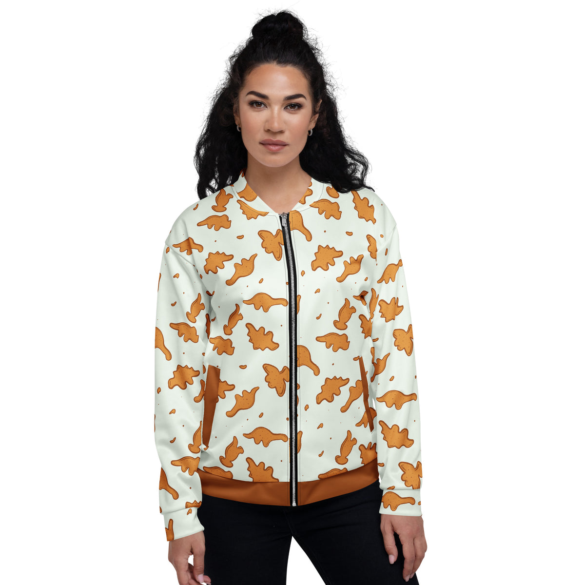 Woman wearing the Dino Nuggies dinosaur jacket with a nugget-brown waistband
