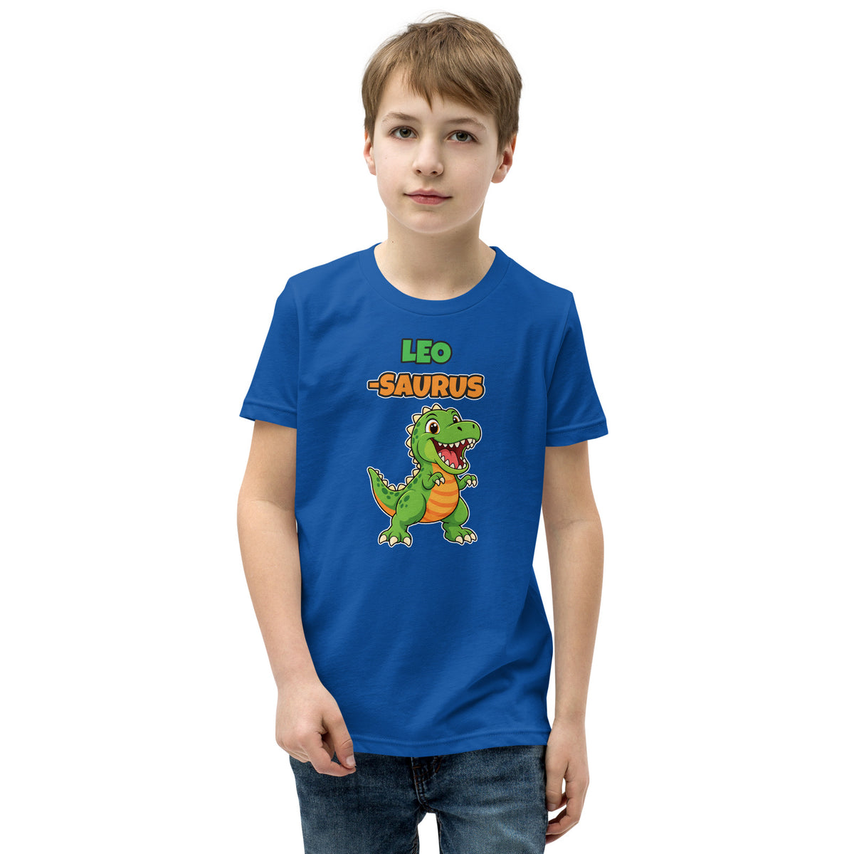 Name-Saurus personalized kids dinosaur t-shirt in True Royal, green cartoon T-rex under the name LEO and the word SAURUS, worn by a child, front view