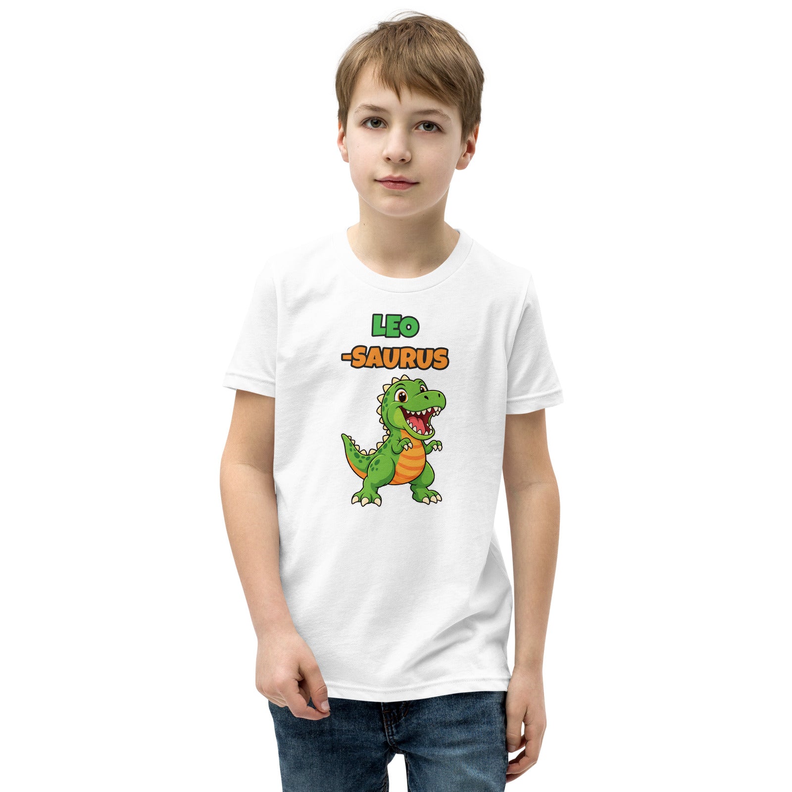 Name-Saurus personalized kids dinosaur t-shirt in White, green cartoon T-rex under the name LEO and the word SAURUS, worn by a child, front view