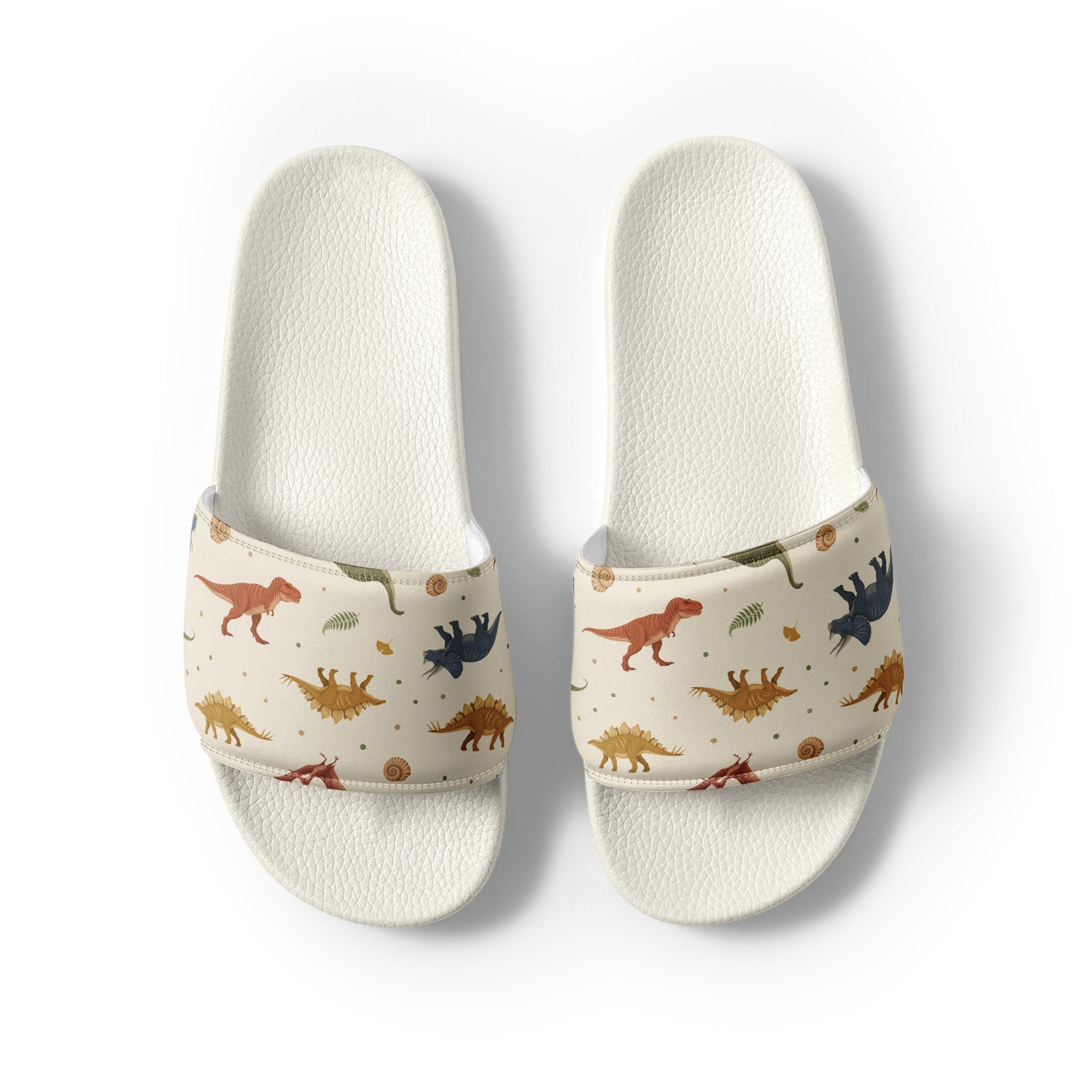Fossil Botanica men's dinosaur slides with white soles, earthy dinosaur and fern print on a cream strap