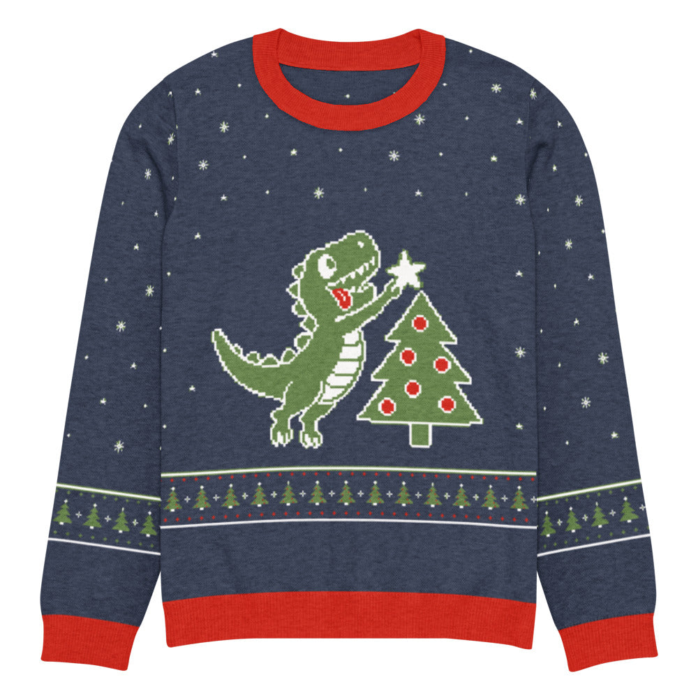 Tree Rex knitted dinosaur ugly Christmas sweater in navy with a green T-rex stretching its tiny arms to put a star on a Christmas tree, white snowflakes and a fair-isle tree band