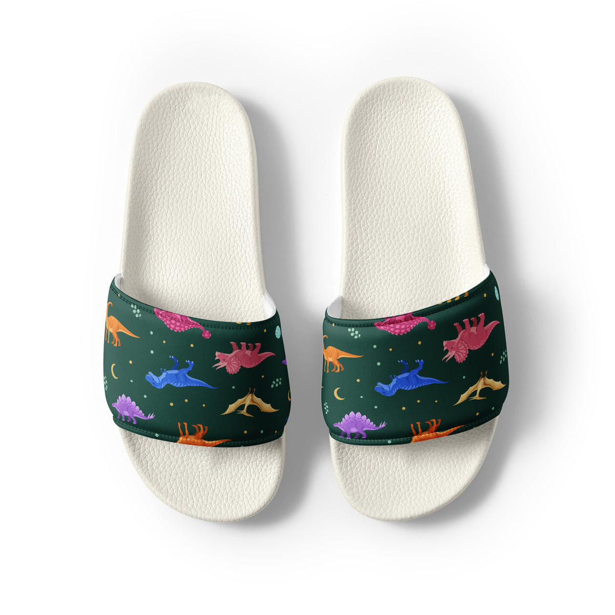 Emerald Jewel Dinos women's dinosaur slides with white soles, jewel-toned dinosaurs on a deep green strap