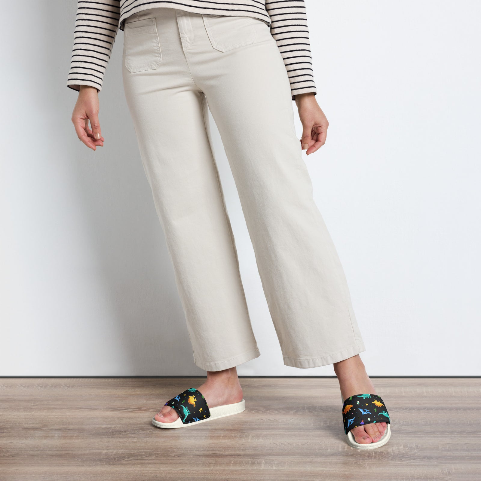 Bright Dinos women's dinosaur slides styled for the pool or beach