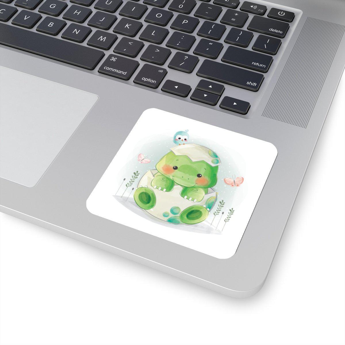 3x3 watercolor dinosaur sticker of a cute baby dinosaur breaking out of his shell.