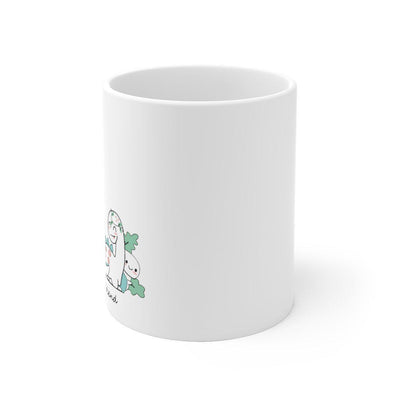 Side view of a we are best friends dinosaur mug featuring adorable baby dinosaurs friends.