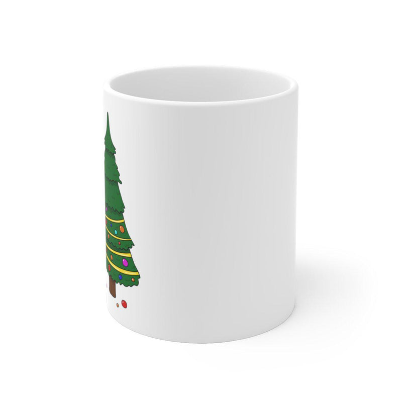 Christmas dinosaur mug where T-Rex is trying to figure out how to decorate the top half of his christmas tree with his tiny arms. 