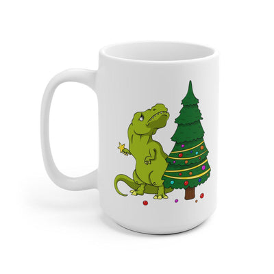 15 oz dinosaur mug with a tiny armed t-rex looking distraught because the top of the Christmas tree is out of his reach.