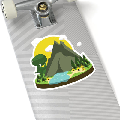6x6 dinosaur sticker on a skateboard with a large but cute t-rex making his way around a mountain and looking down on a tribal village.