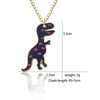 Purple t-rex with red polka dots on the end of a necklace.